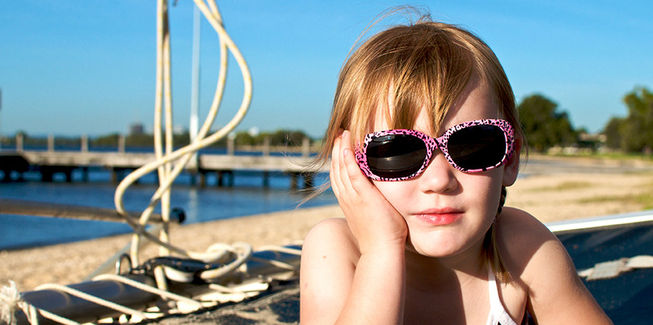 Girl in JBanz children's sunglasses
