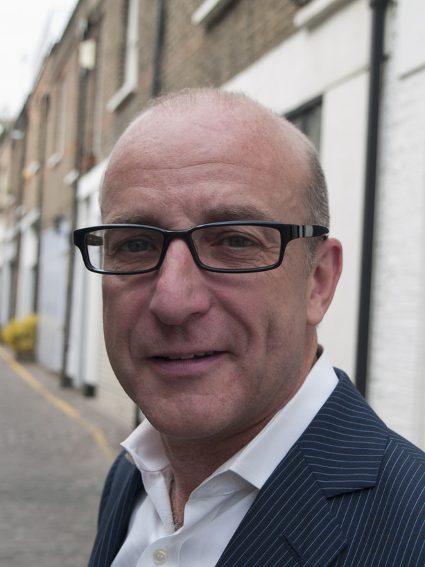 Paul McKenna in his new glasses/spectacles from his Optician Alisdair Buchanan at Buchanan Optometrists, Kent